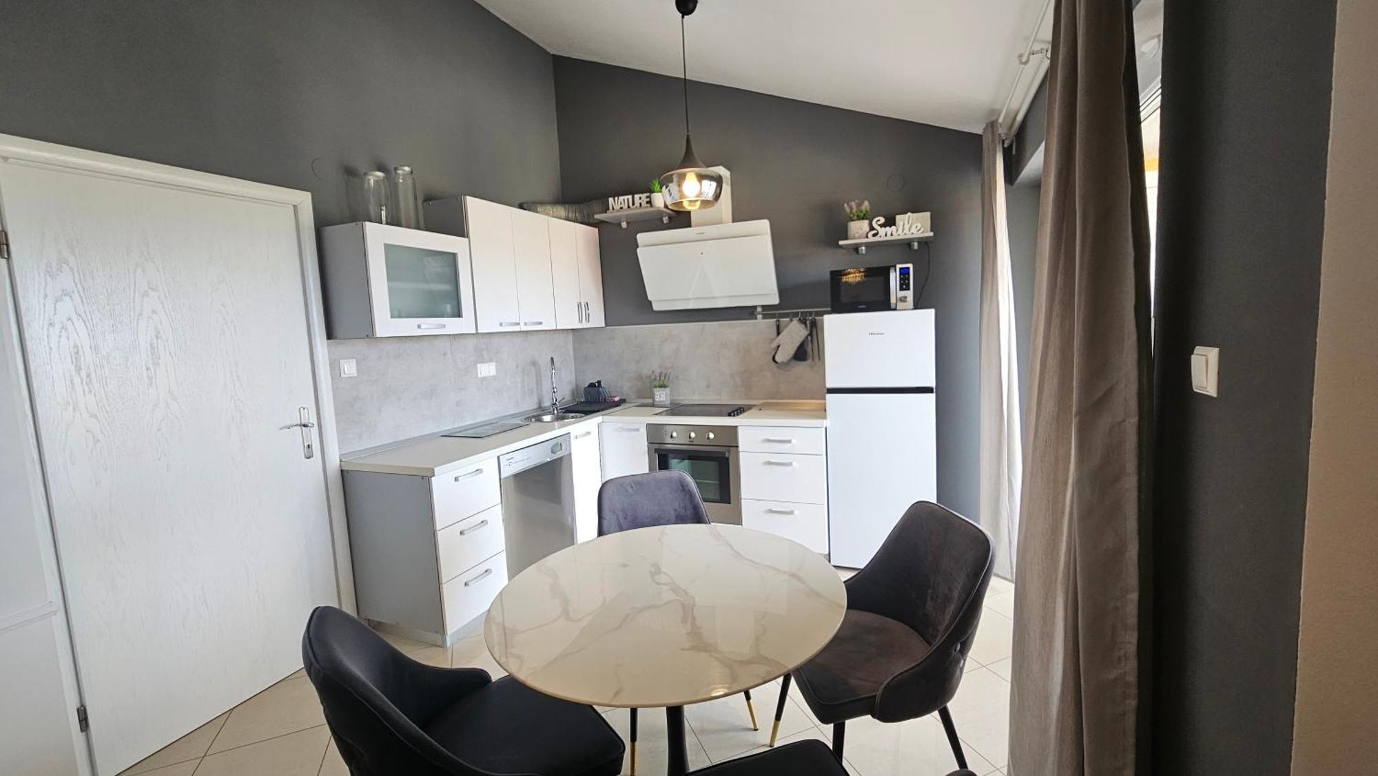 Apartman Moris Malinska Buitenkant foto